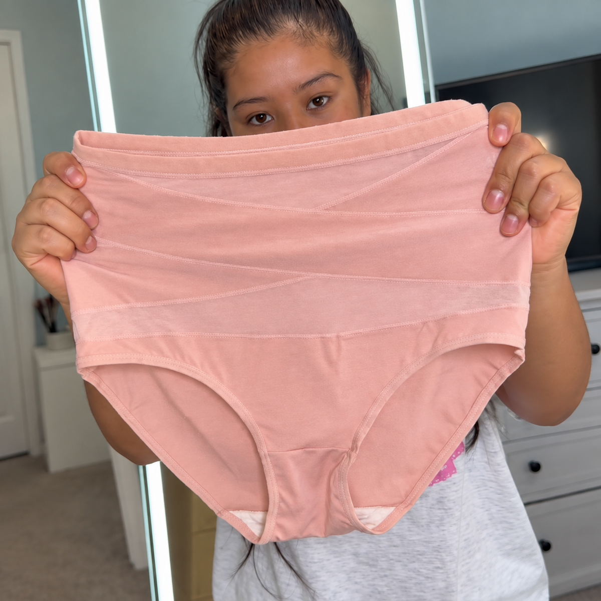 Customer holding Lilysure shaping underwear